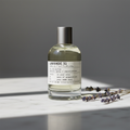 Le Labo Lavande 31 bottle on marble surface with dried lavender sprigs, soft natural light